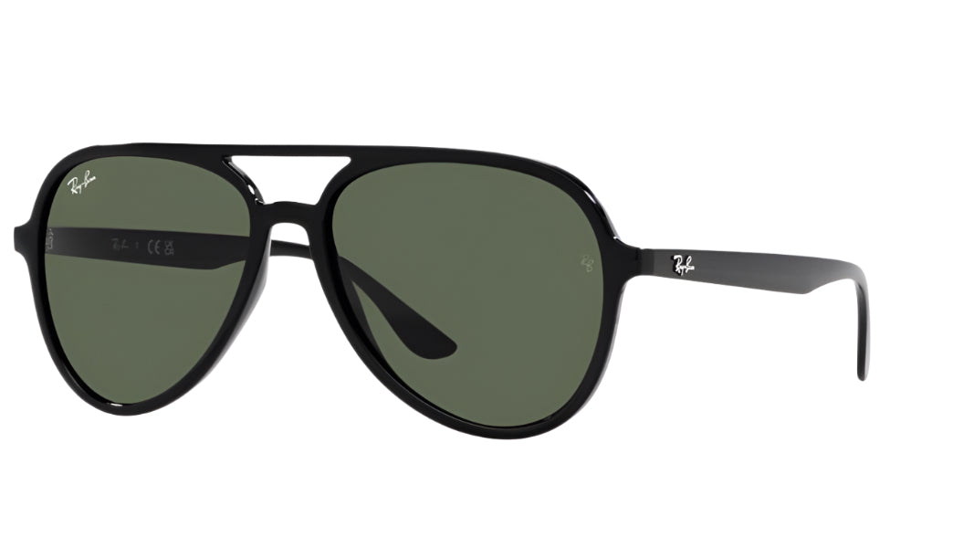 Black sunglasses with green lenses on a white background