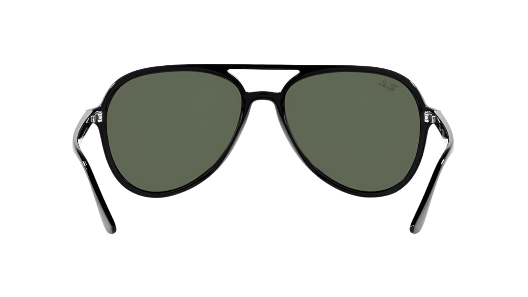 Aviator sunglasses with dark lenses on a white background
