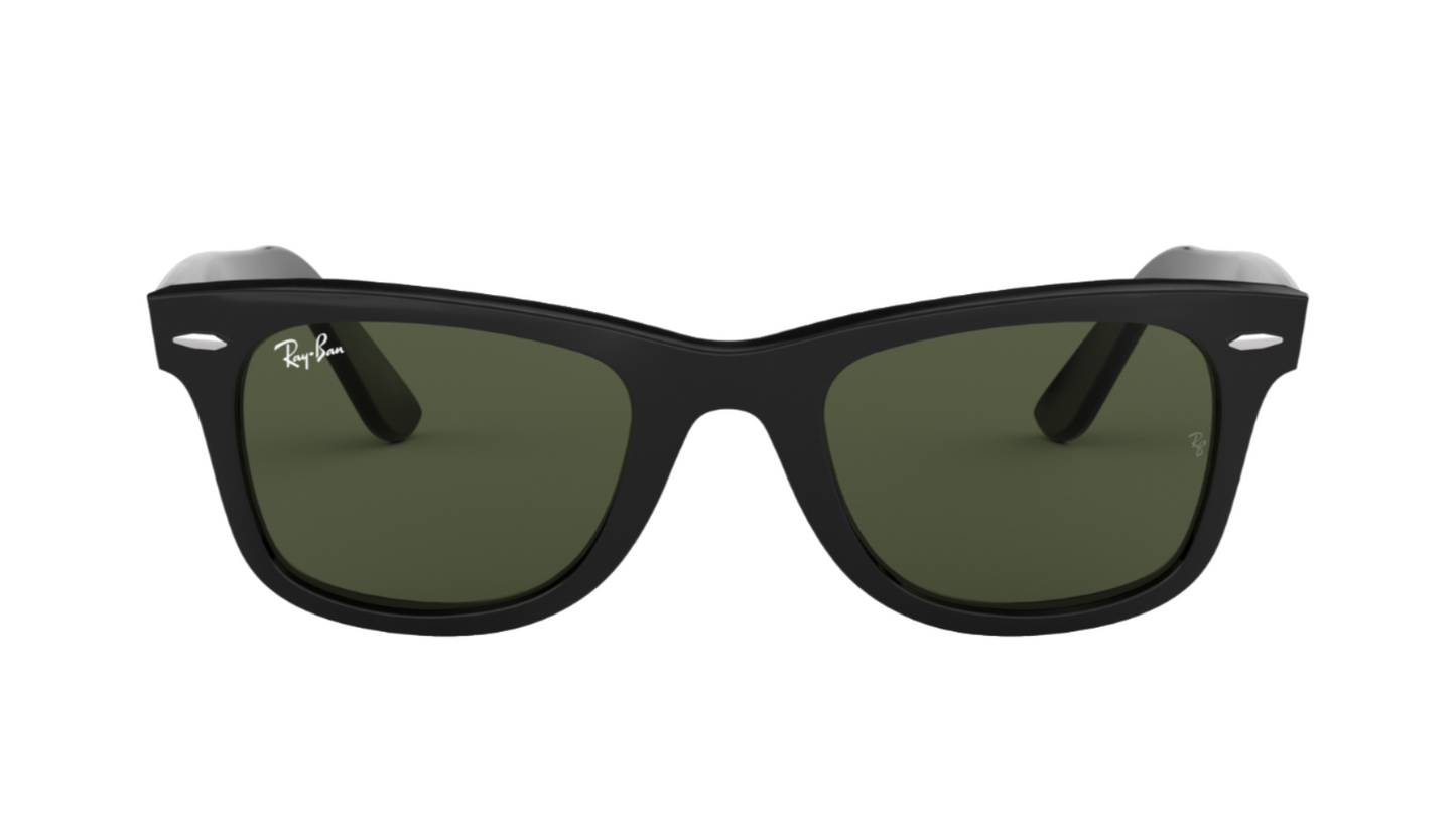 Black sunglasses with green lenses on a white background