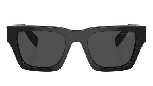 Front-facing view of PRADA SPR A06 16K 08Z sunglasses with dark lenses and sharp, structured edges.