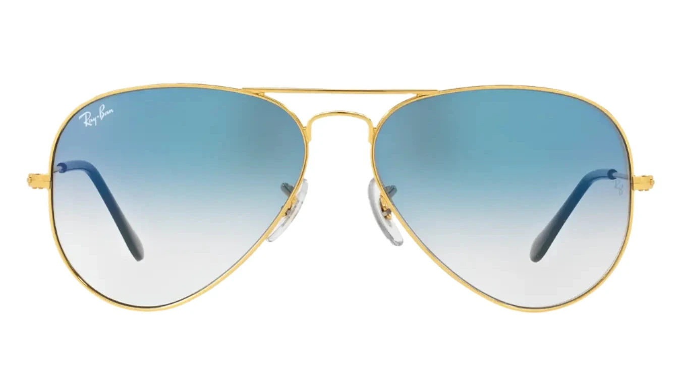 Front view of Ray-Ban RB3025I 001/3F aviator sunglasses featuring gradient blue lenses and a classic gold metal frame.
