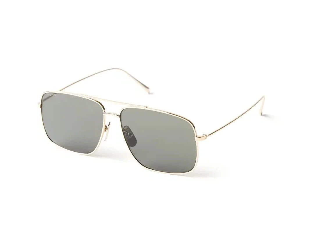 Aviator-style sunglasses with a sleek metal frame and gradient brown lenses. The design features a double bridge and thin arms with brown-tipped earpieces, giving them a classic and timeless look. The lenses transition smoothly from dark to light, adding a stylish flair while providing sun protection.