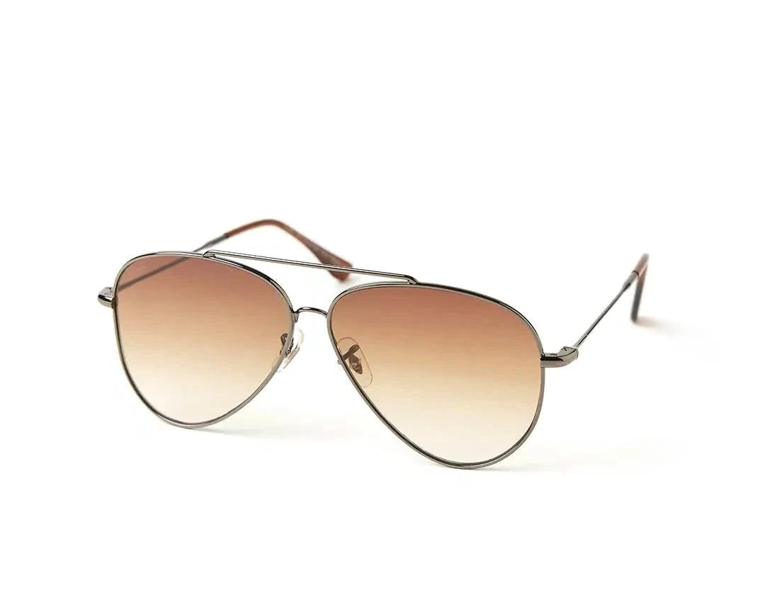 Aviator-style sunglasses with a sleek metal frame and gradient brown lenses. The design features a double bridge and thin arms with brown-tipped earpieces, giving them a classic and timeless look. The lenses transition smoothly from dark to light, adding a stylish flair while providing sun protection.