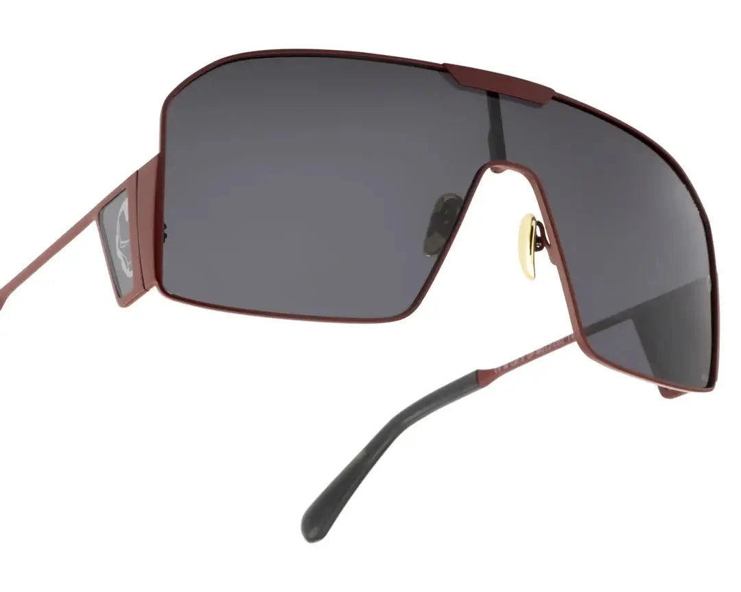 OPIUM OP M012 C02 Ironman Limited Edition sunglasses with a bold red and gold frame, UV-protected lenses, and a sleek design inspired by Marvel’s Iron Man.