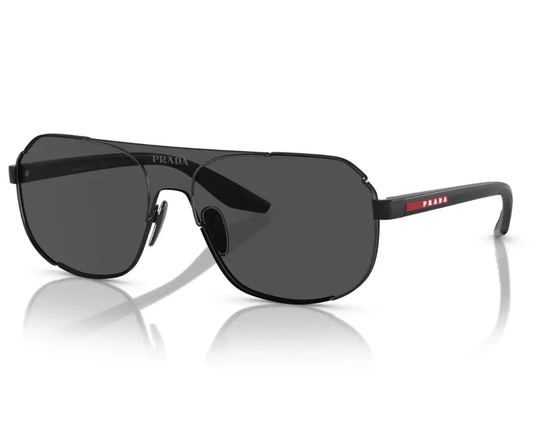 Angled view of PRADA SPS 53YS 1AB06F sunglasses highlighting the modern square frame and dark grey lenses.