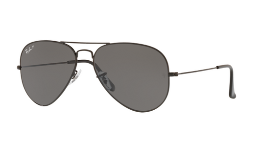 Aviator sunglasses with dark lenses on a white background
