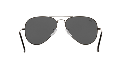 Aviator sunglasses with dark lenses on a white background