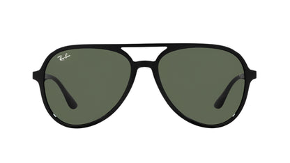 Aviator sunglasses with dark green lenses and black frames on a white background