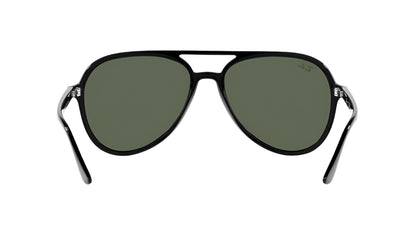 Aviator sunglasses with dark lenses on a white background