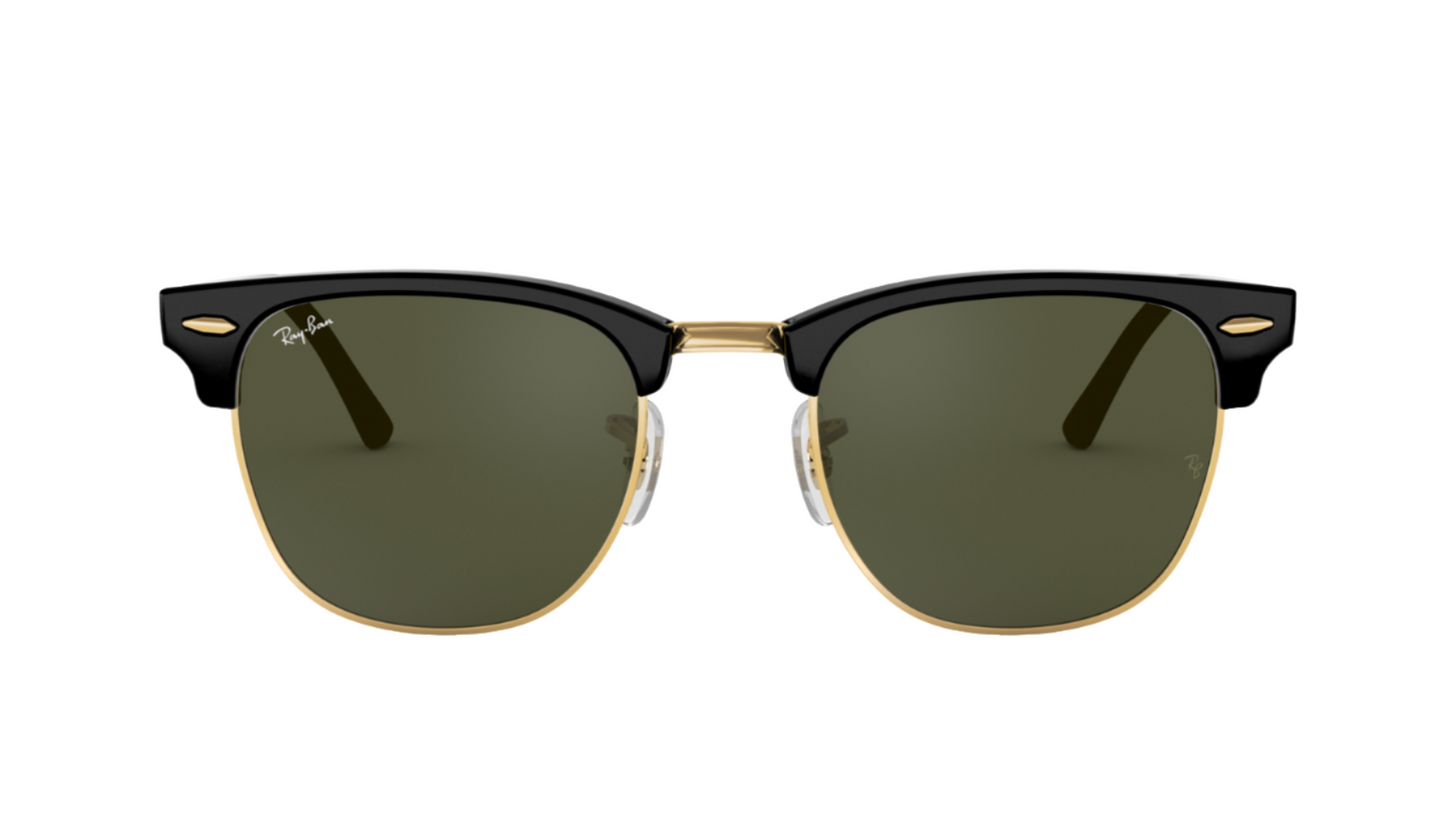 Sunglasses with black frame and green lenses on a white background