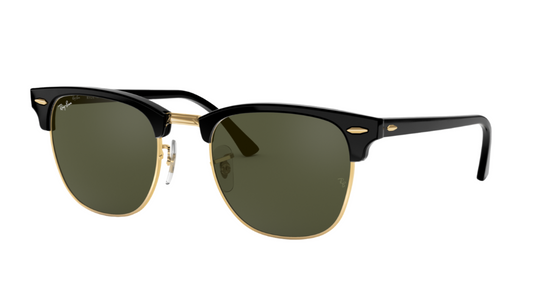Black and gold sunglasses with green lenses on a white background