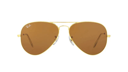 "Ray-Ban Aviator Classic sunglasses with a gold metal frame and brown gradient lenses, featuring a teardrop shape and thin temples, designed for unisex wear.