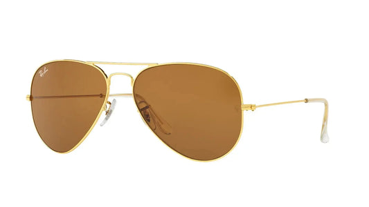 "Ray-Ban Aviator Classic sunglasses with a gold metal frame and brown gradient lenses, featuring a teardrop shape and thin temples, designed for unisex wear.