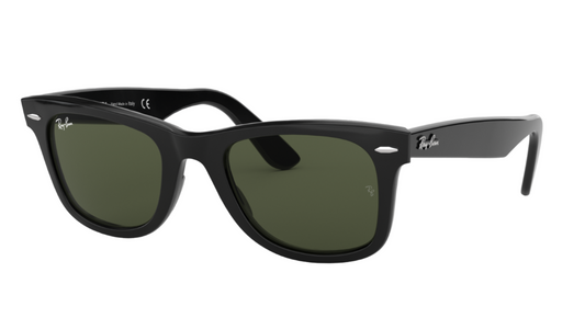 Black sunglasses with green lenses on a white background
