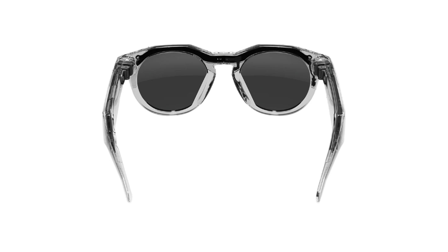 Sunglasses with black lenses and transparent frame on a white background
